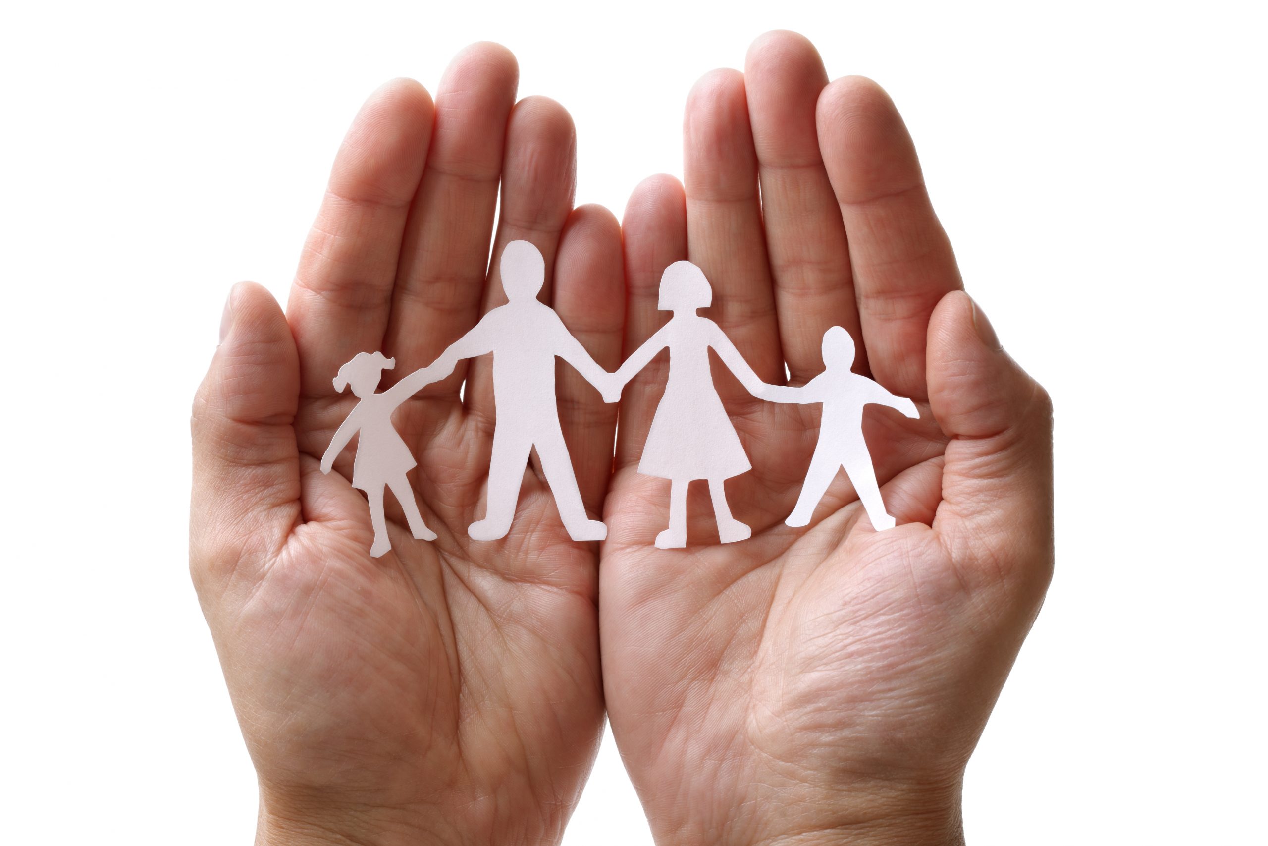 Paper chain family protected in cupped hands Paper chain family protected in cupped hands