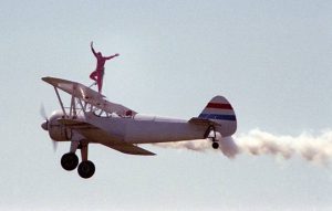 Person on top of plane