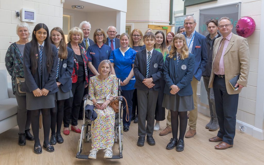 Patients, charity workers and trustees, councillors and pupils from Sir Graham Balfour High at Katharine House Hospice Therapy & Wellbeing Centre opening