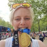 Charity runner Catherine with her 2025 London Marathon medal after the race.