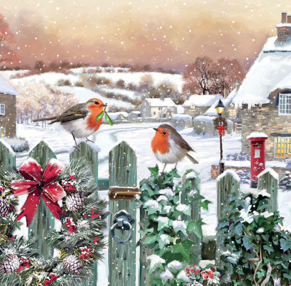 Snowy Christmas scene featuring two robins sitting on a garden fence.