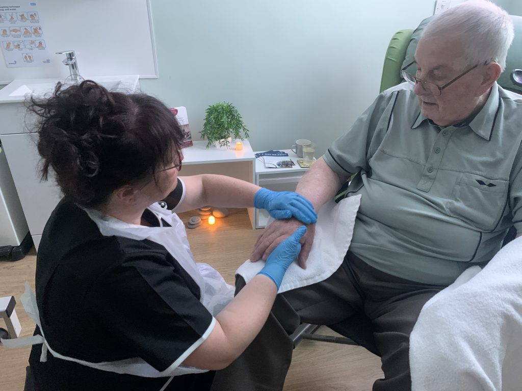 Patient receiving complementary therapy A patient receiving complementary therapy.