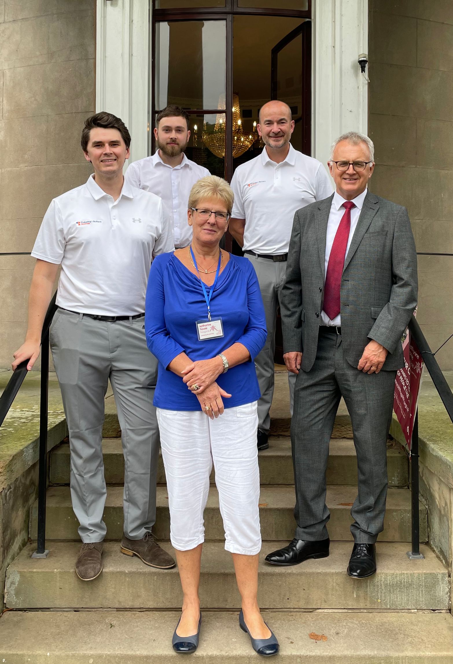 Pickering and Butters pictured with Stephanie Harris, Vice-chairman of Trustees, at the 2023 Katharine House Hospice Charity Golf Day. Stephanie Harris, Katharine House Hospice Vice-chairman of Trustees, standing with four male representatives of Picking and Butters Solicitors, Stafford.