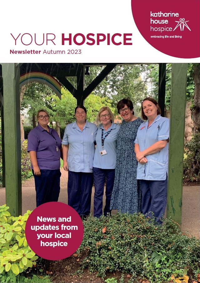 Front cover of Your Hospice autumn 2023 with a group of 5 staff members stood together smiling