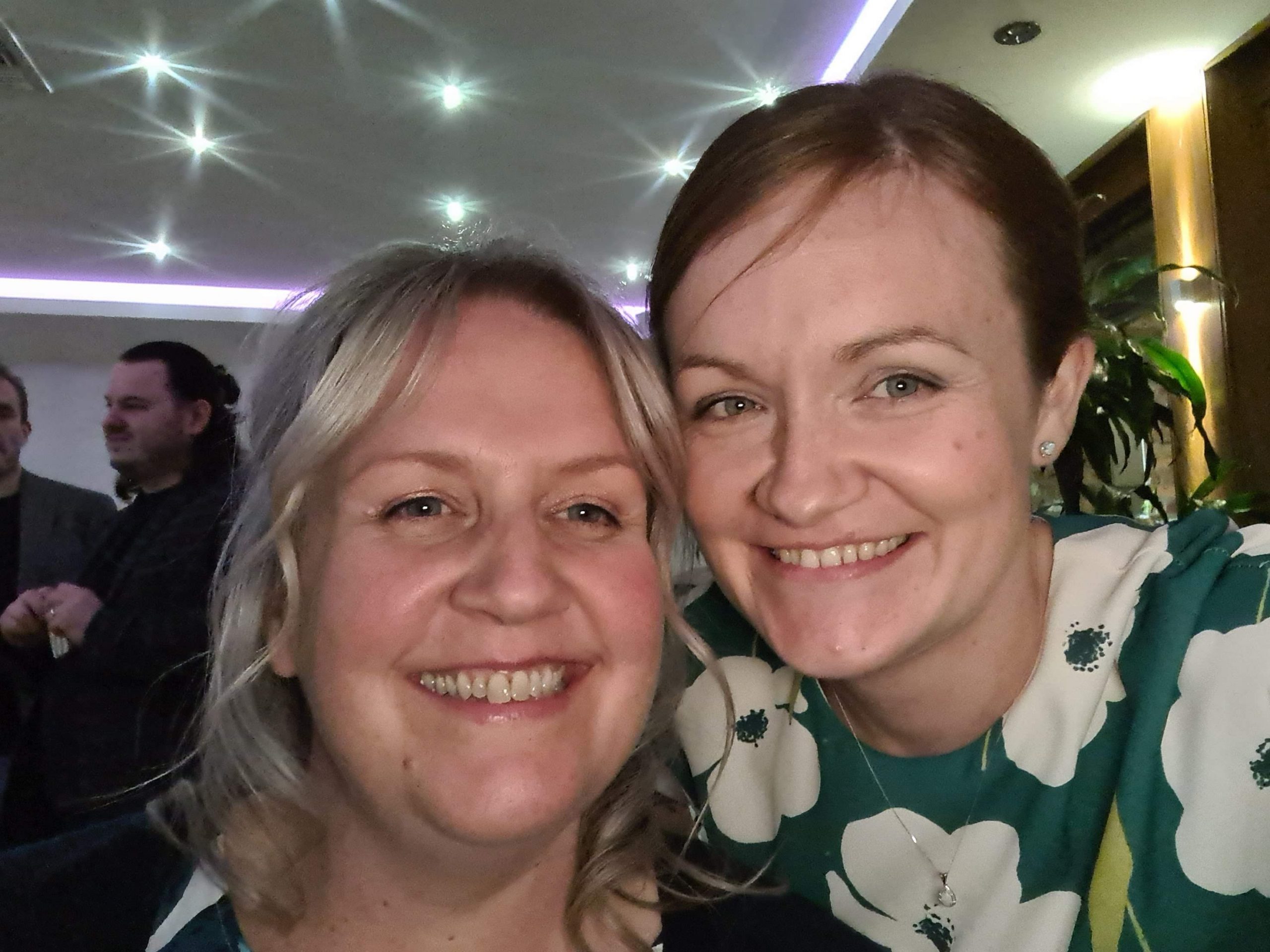 Marie with her daughter, Angela, at a party.