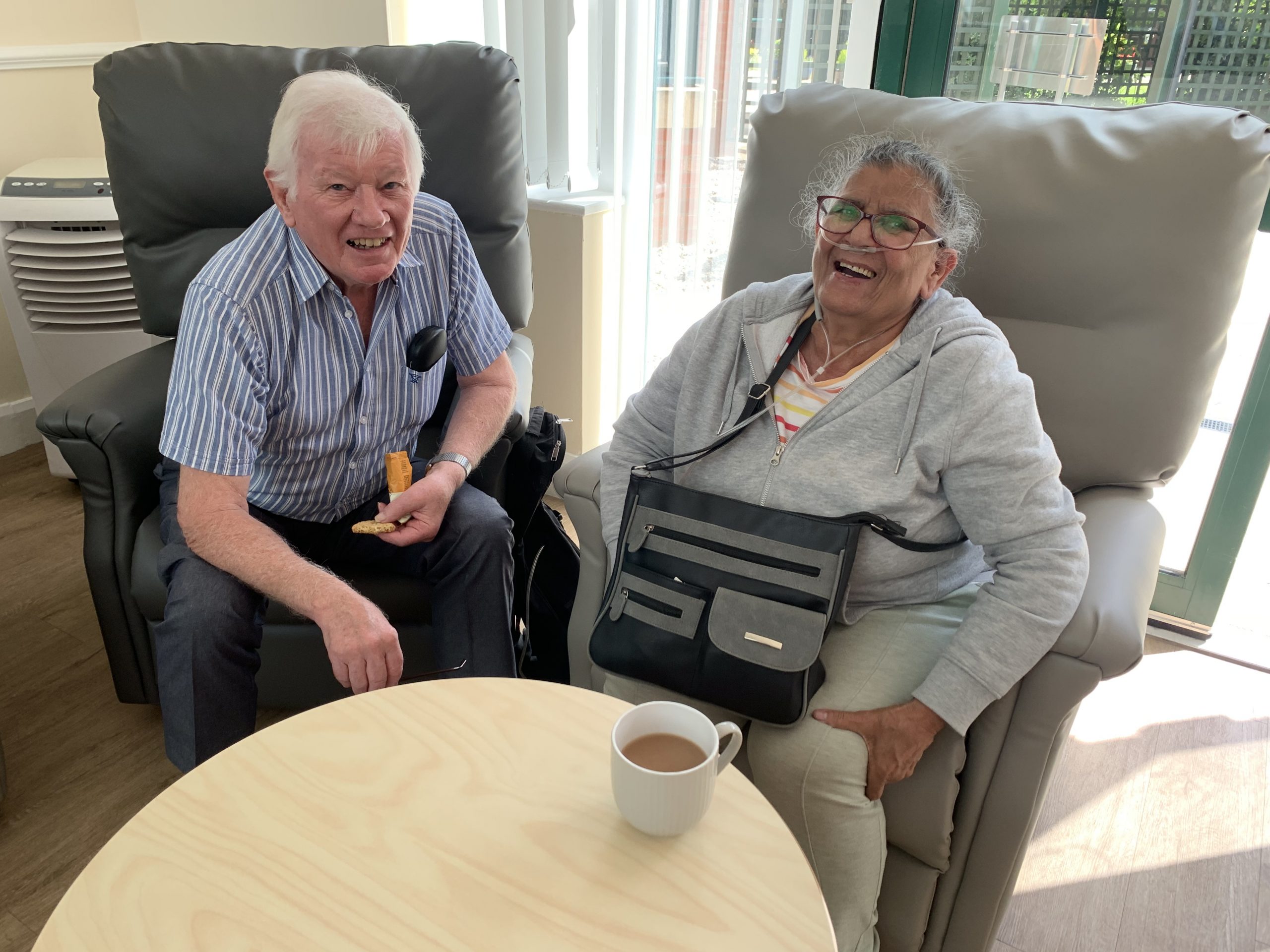 A patient and her husband at one of our coffee mornings.