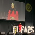 Lisa Snowdon on stage presenting the Smiley Charity Film Awards