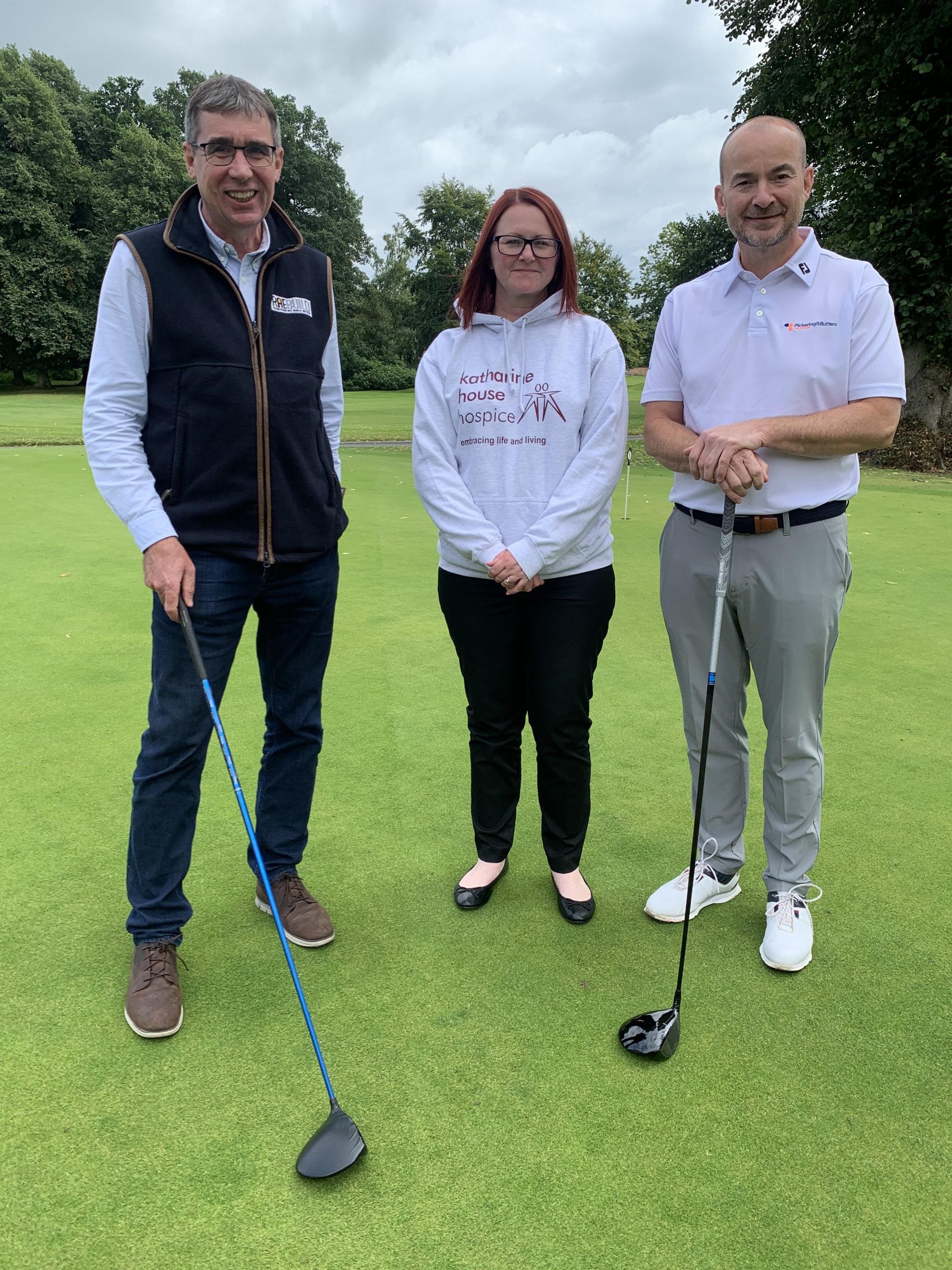 Golf Day Sponsors RAE Build and Pickering & Butters with KHH Fundraising and Events Coordinator Lyndsey