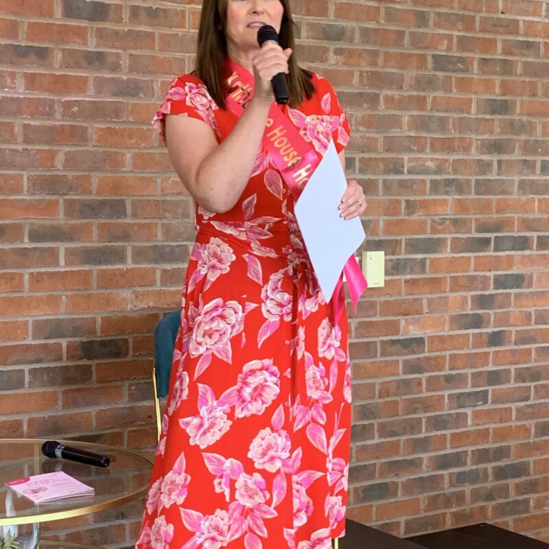 Event organiser, Lyndsey, welcomes the guests