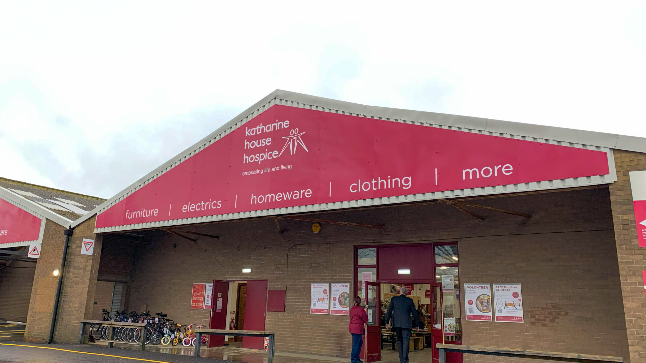 Exterior of the Katharine House Hospice Superstore in Stafford, with the main entrance and signage advertising furniture, electricals, homeware and clothing.