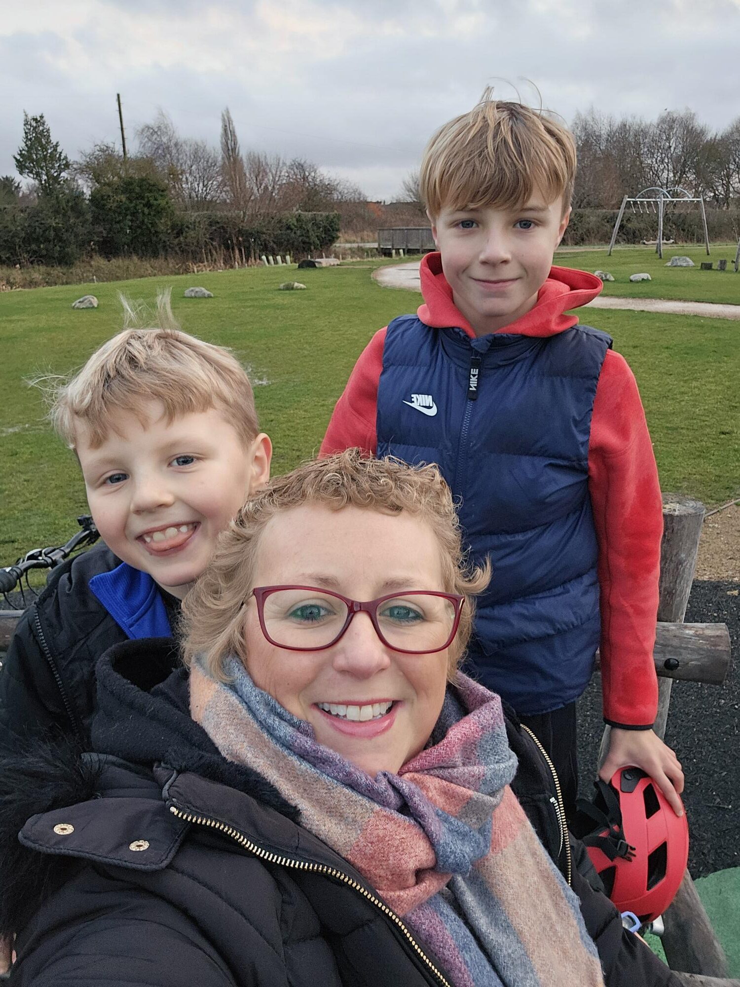 Mel with her sons at football