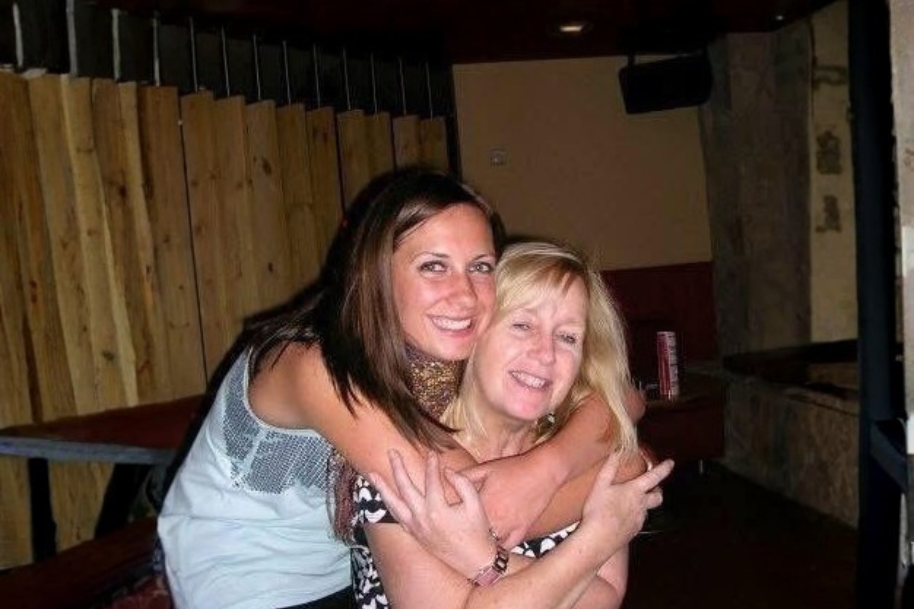 A mum and daughter hugging