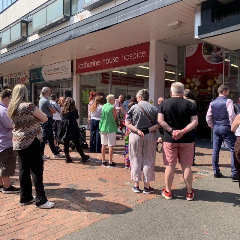 The first customers waiting to go inside
