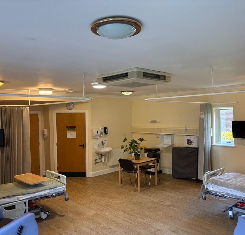 Original IPU multi-occupancy ward-style room.