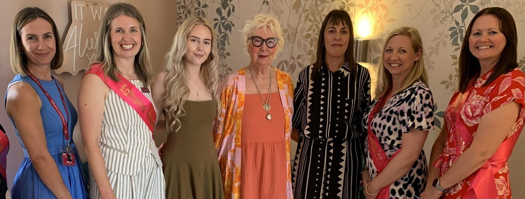Jenny Eclair standing with a group of women