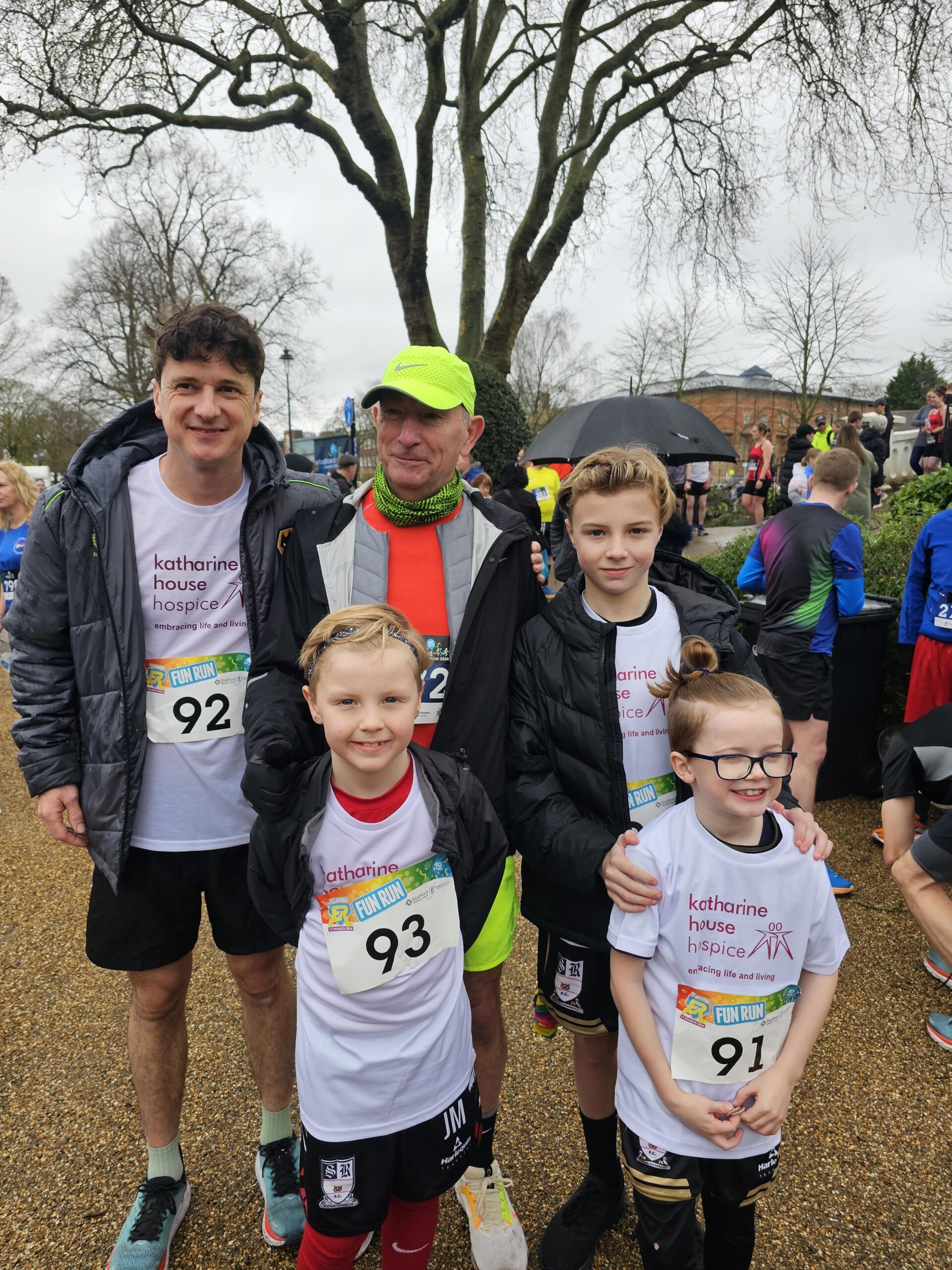 The Mahon family in Katharine House t-shirts and coats at a fundraising run
