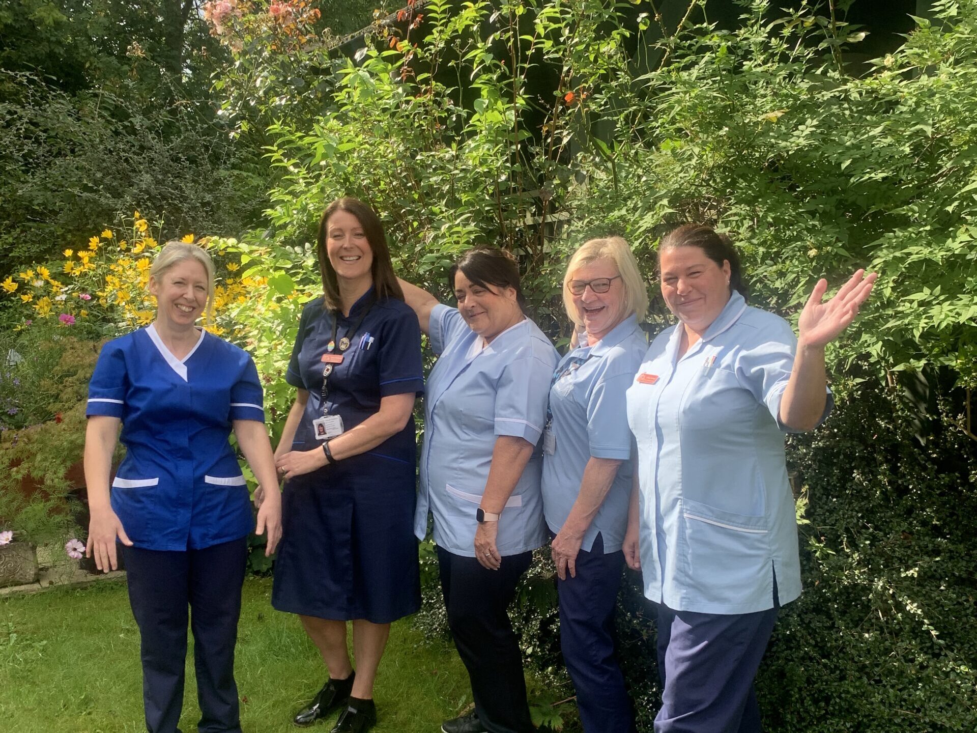 Five nurses in the hospice garden