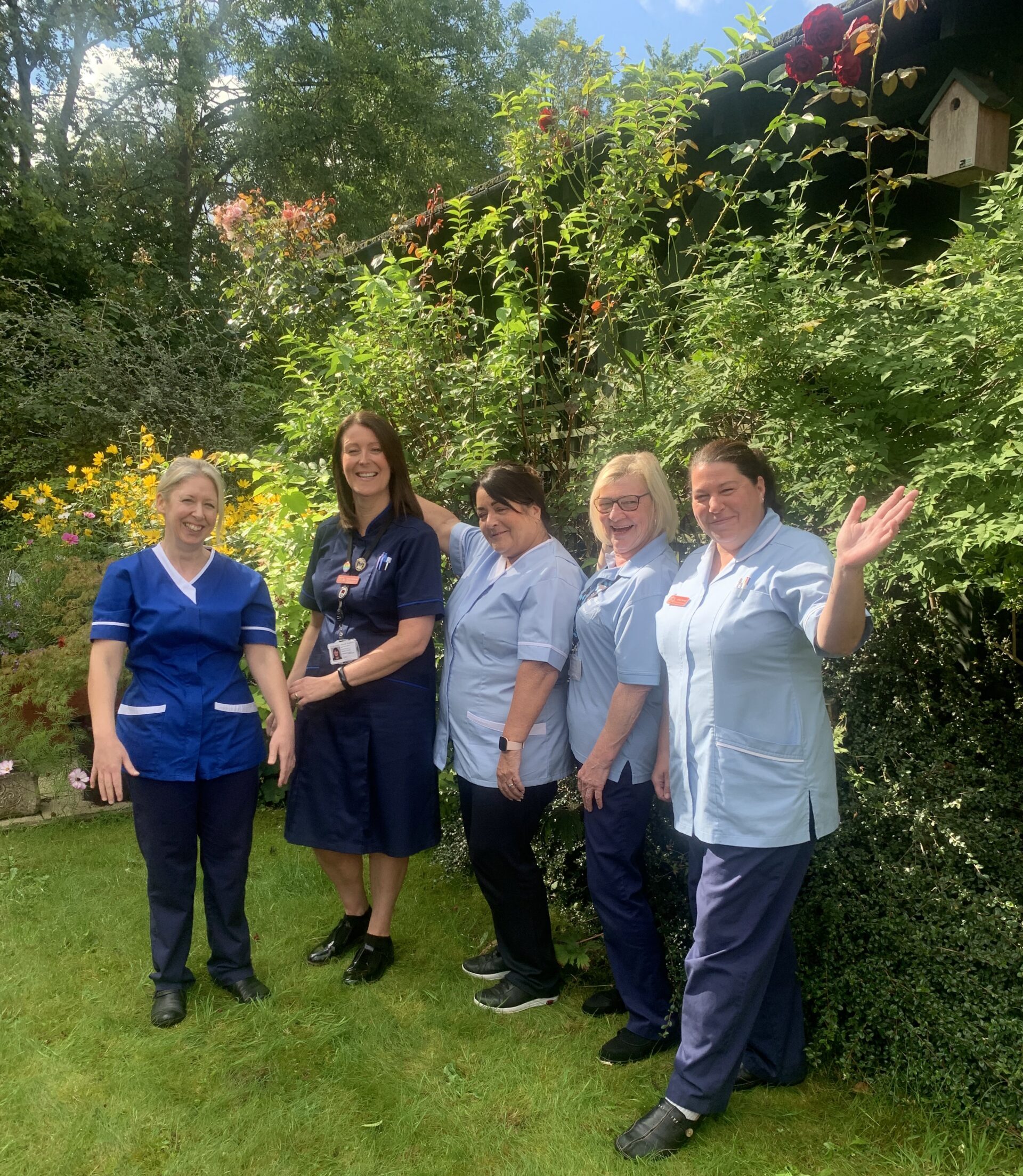 Five nurses in the hospice garden