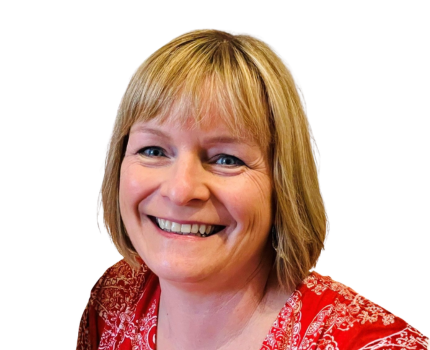 Profile photo of Helen. A lady with a blonde bob and fringe, wearing a red top.